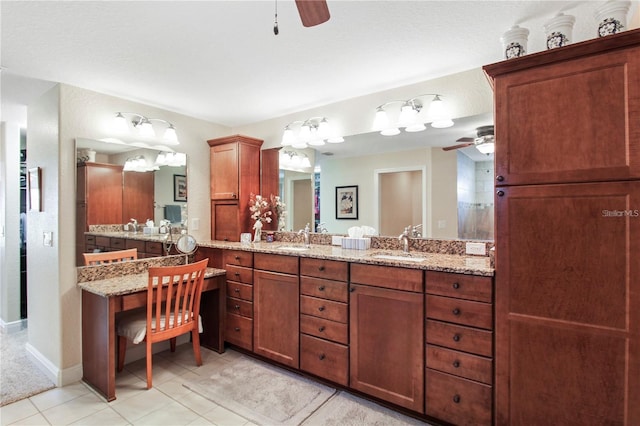 bathroom featuring tile patterned floors, ceiling fan, walk in shower, and vanity