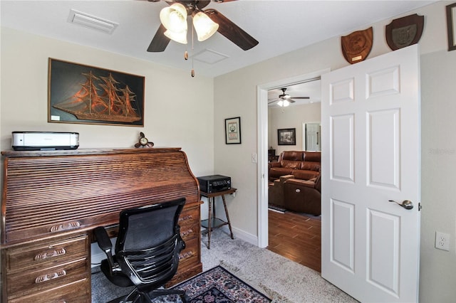 office area with light wood-type flooring and ceiling fan