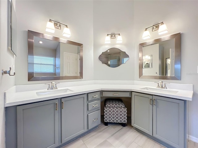 bathroom with vanity and tile patterned floors