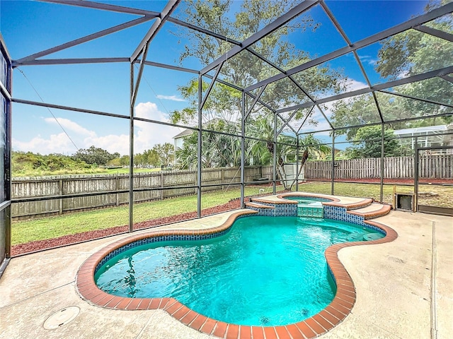 view of swimming pool featuring an in ground hot tub, a patio, and a lanai