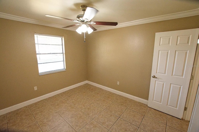 tiled empty room with ornamental molding and ceiling fan