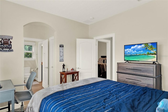 bedroom featuring ensuite bathroom