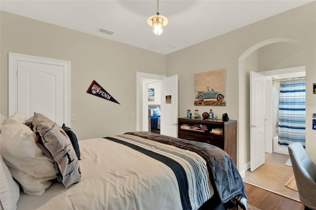 bedroom with light hardwood / wood-style flooring