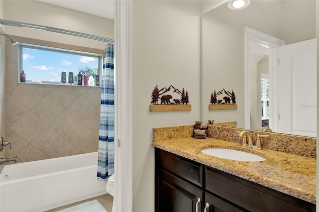 full bathroom featuring shower / tub combo with curtain, vanity, and toilet