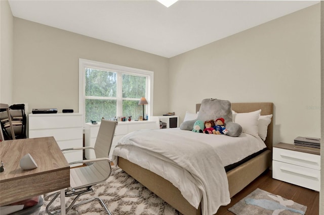 bedroom featuring dark hardwood / wood-style floors