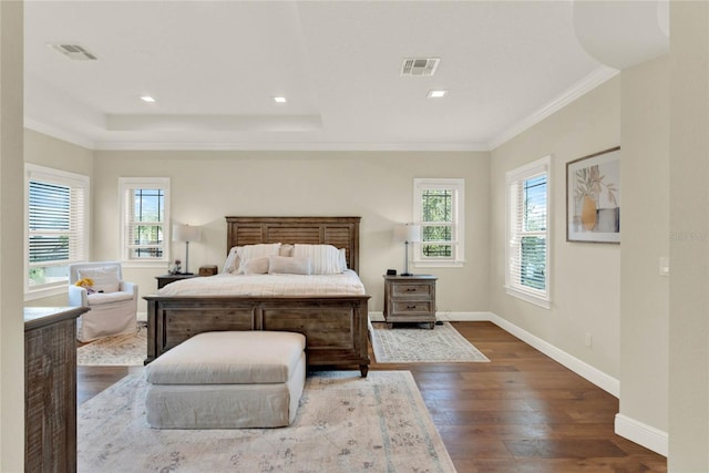 bedroom with ornamental molding and dark wood-type flooring