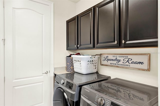 laundry area with cabinets and independent washer and dryer