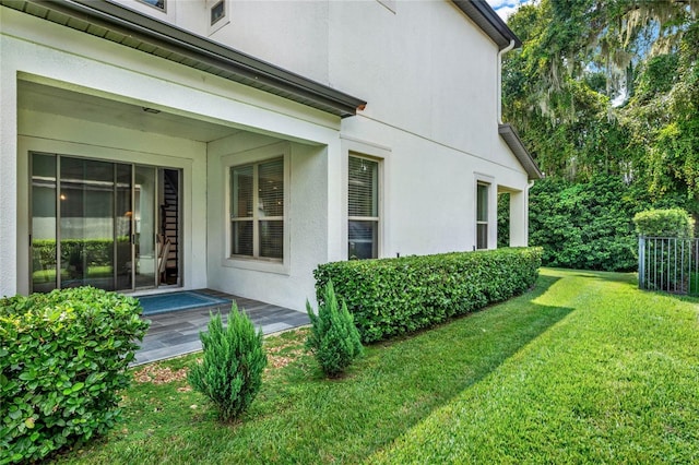 view of property exterior featuring a yard