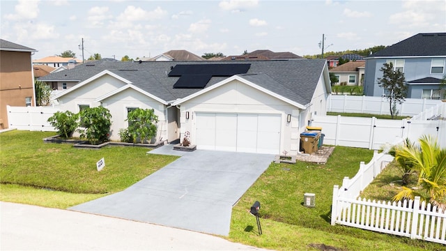 ranch-style house with a front yard and a garage