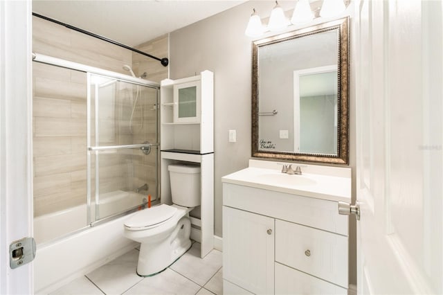 full bathroom with vanity, toilet, tile patterned floors, and enclosed tub / shower combo