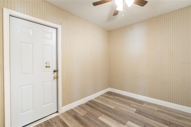 interior space with ceiling fan and light wood-type flooring