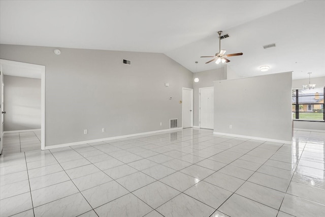 tiled spare room with ceiling fan with notable chandelier and vaulted ceiling