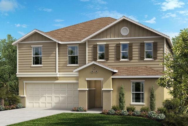 view of front facade with a front yard and a garage