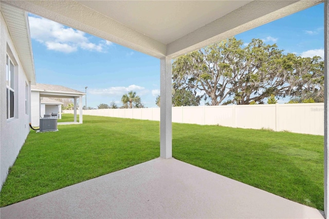 view of yard featuring cooling unit and a patio area