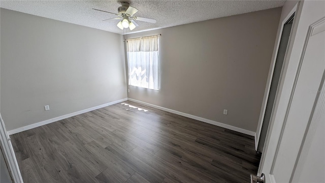 unfurnished bedroom with ceiling fan, dark hardwood / wood-style floors, and a textured ceiling