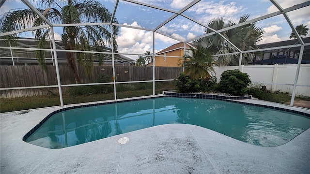 view of pool with a lanai