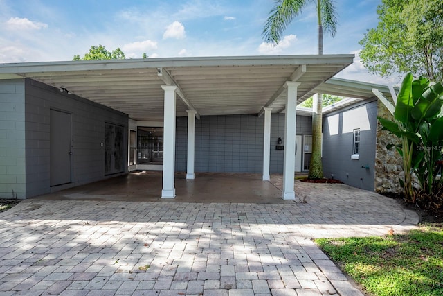 view of patio featuring a carport