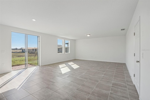 view of tiled empty room