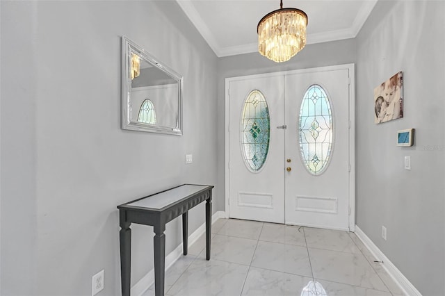 foyer entrance featuring french doors, crown molding, and a notable chandelier