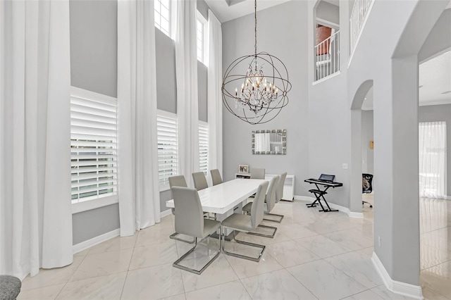 dining room featuring a notable chandelier