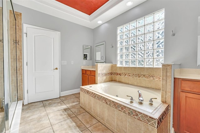 bathroom with plenty of natural light, crown molding, tile patterned floors, and vanity