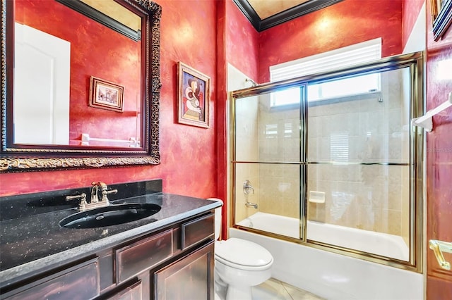 full bathroom featuring tile patterned flooring, combined bath / shower with glass door, vanity, and toilet