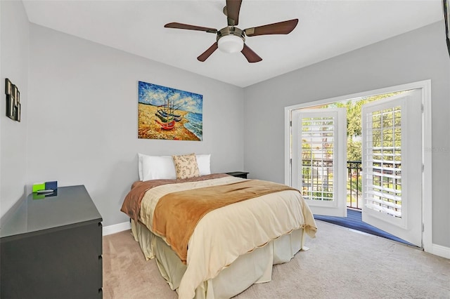 carpeted bedroom featuring access to exterior and ceiling fan