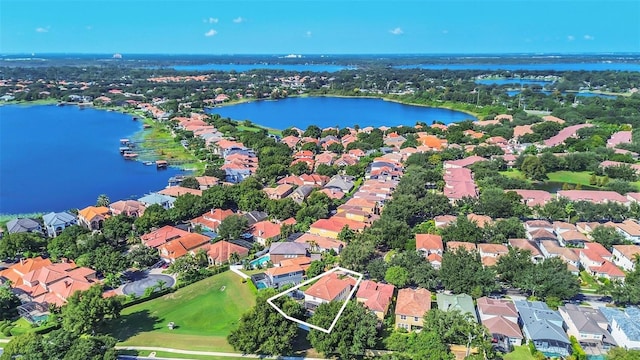 drone / aerial view with a water view