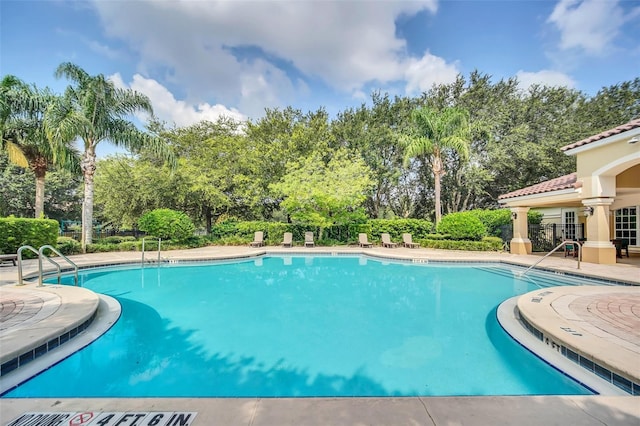 view of pool with a patio area