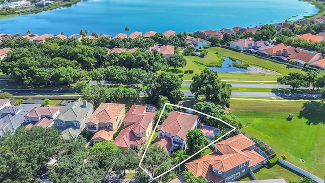 birds eye view of property featuring a water view