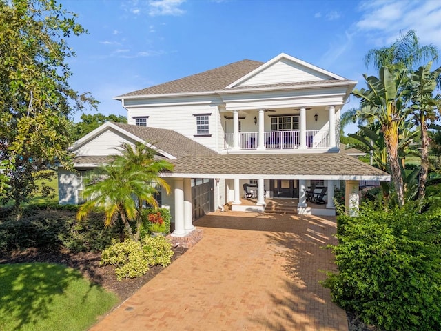 view of front of home featuring a balcony