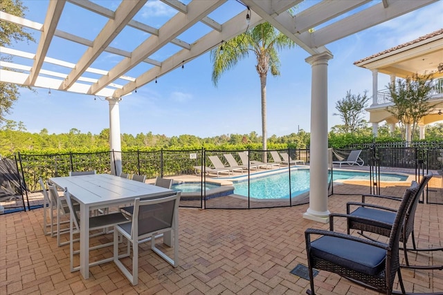 view of swimming pool with an in ground hot tub, a pergola, and a patio area