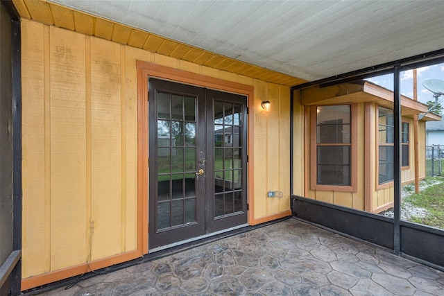 entrance to property with french doors and a patio