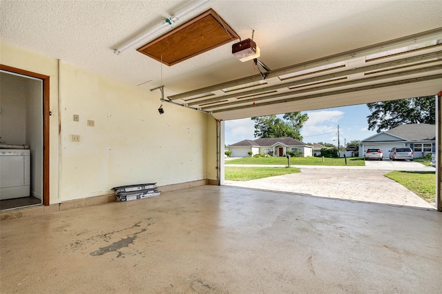 3186 Mapleshade St, Deltona, FL 32738 - garage featuring washer / dryer and a garage door opener