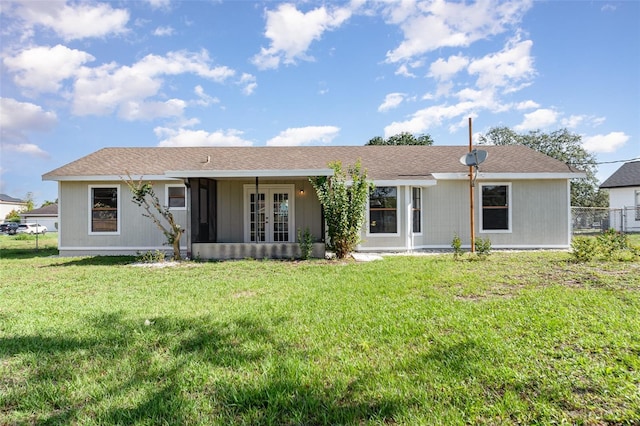 3186 Mapleshade St, Deltona, FL 32738 - rear view of property featuring french doors
