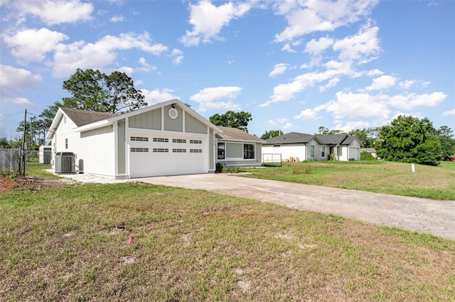 3186 Mapleshade St, Deltona, FL 32738 - view of front of house with cooling unit, driveway, and an attached garage