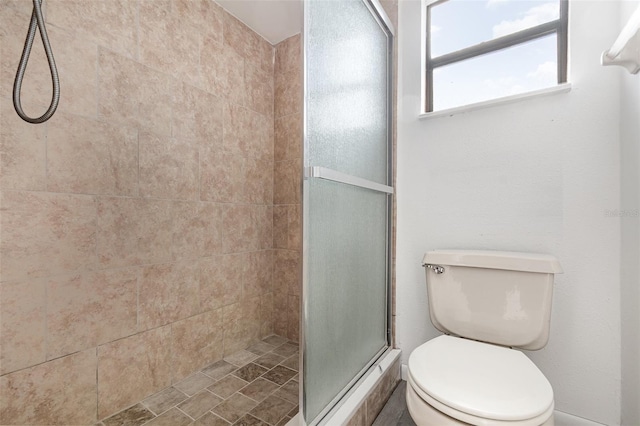 3186 Mapleshade St, Deltona, FL 32738 - full bathroom featuring a shower stall and toilet