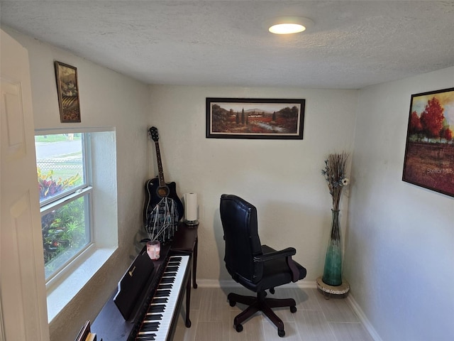 office featuring a textured ceiling