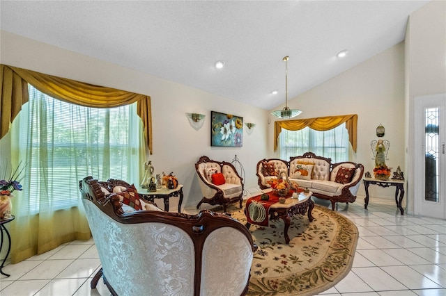 tiled living room with high vaulted ceiling