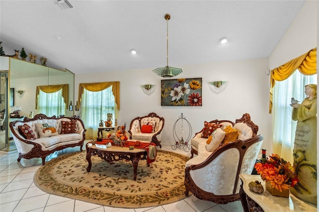 tiled living room with vaulted ceiling