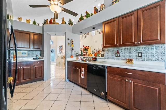 kitchen featuring ceiling fan, light tile patterned floors, sink, backsplash, and black appliances