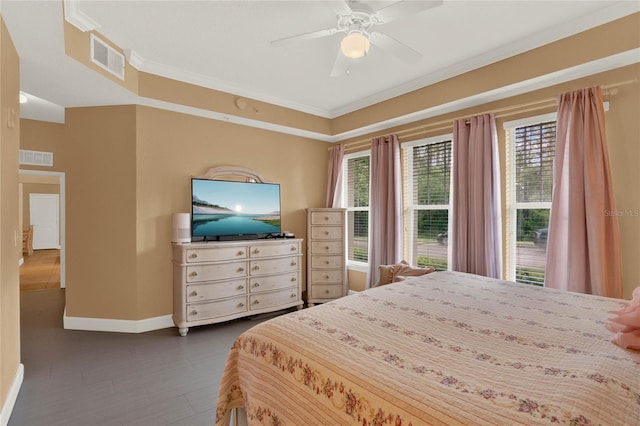 bedroom featuring ceiling fan and ornamental molding