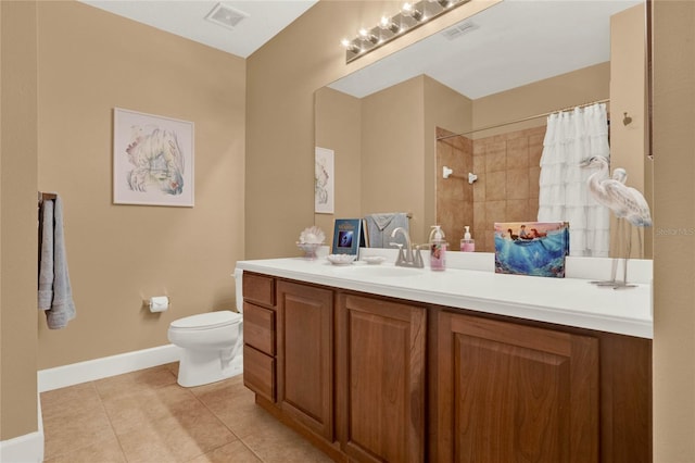 bathroom with walk in shower, vanity, toilet, and tile patterned floors