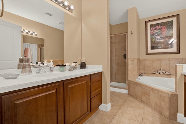 bathroom with shower with separate bathtub, tile patterned floors, and vanity