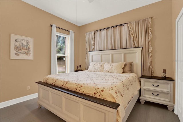 bedroom featuring dark hardwood / wood-style floors