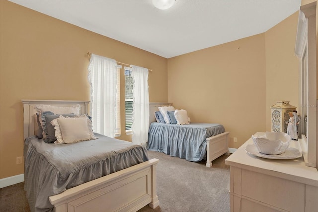 bedroom with light colored carpet