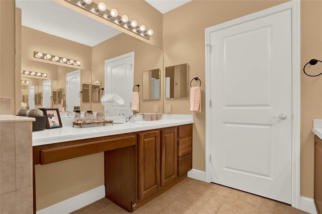 bathroom featuring tile patterned floors and vanity