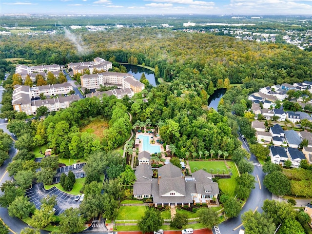 birds eye view of property featuring a water view