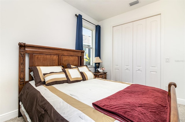 bedroom featuring a closet and carpet