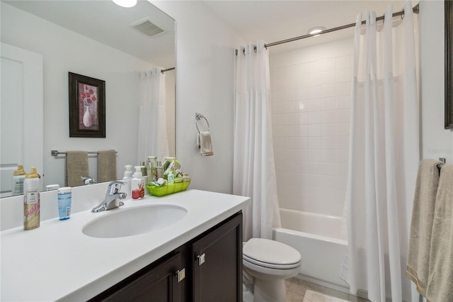 full bathroom with vanity, toilet, and shower / bath combo with shower curtain